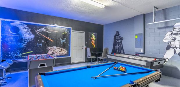 Foto de la sala de juegos de una casa de alquiler vacacional en Champions Gate Resort en Orlando, Florida, USA.